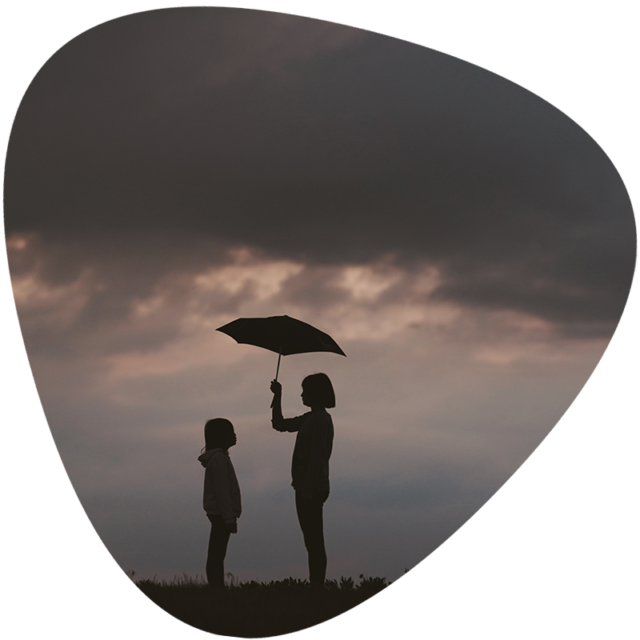 Service and Resources. Image of umbrella being held out for child